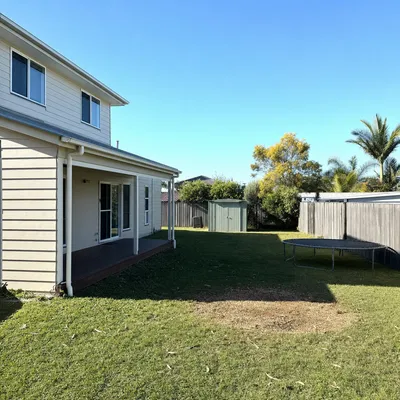 After: River red gum lean over a bluestone roof, Adelaide